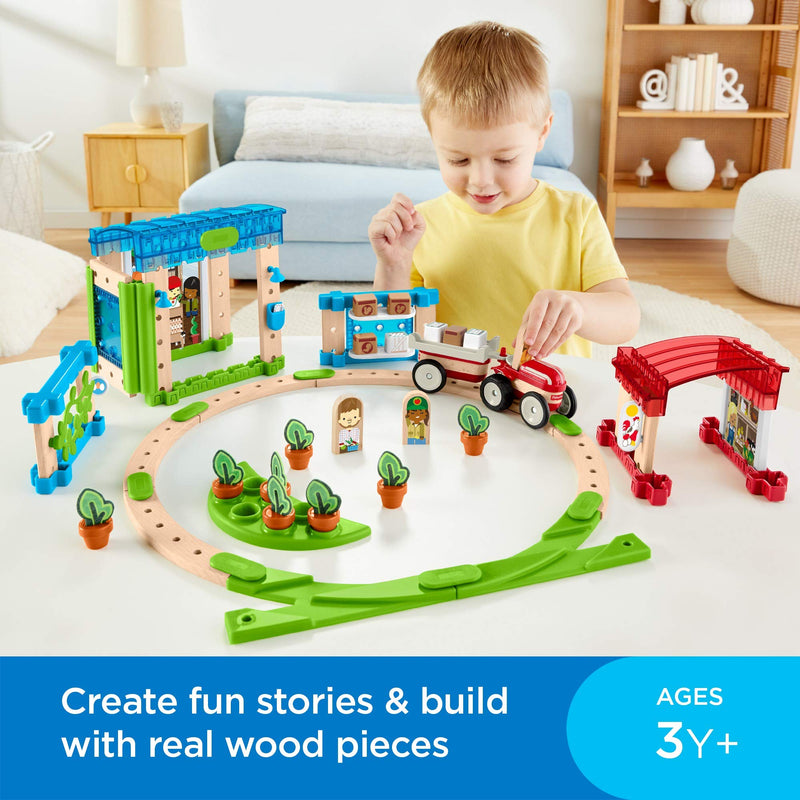 Fisher-Price Build Around Town Starter Kit - 75+ Building and Wooden Track Play Set  Via Amazon