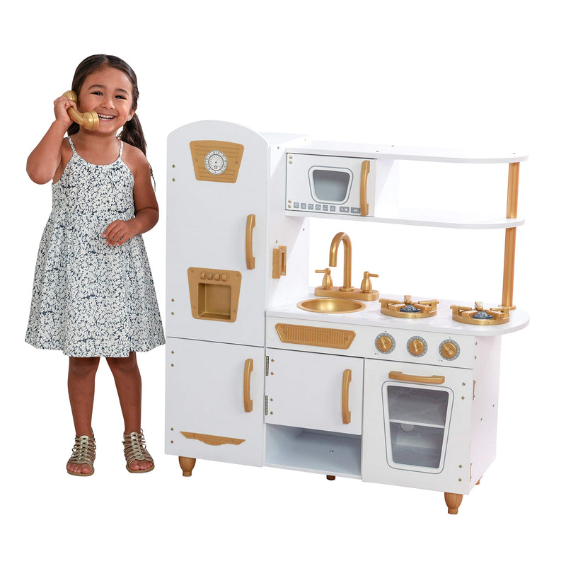 KidKraft Modern White Play Kitchen with Gold Accents & 27 Piece Cookware Set Via Amazon